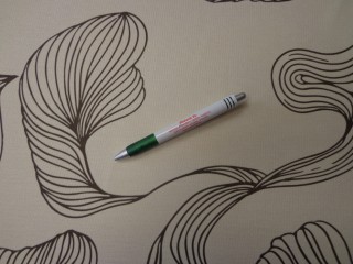 Dekorációs szövet, ekrü alapon fekete mintás (15367)